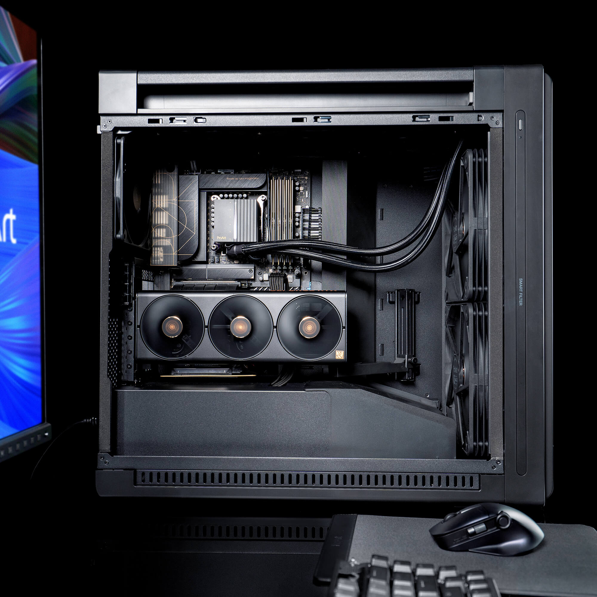 ProArt PA602 PC build side view with ProArt display and mouse