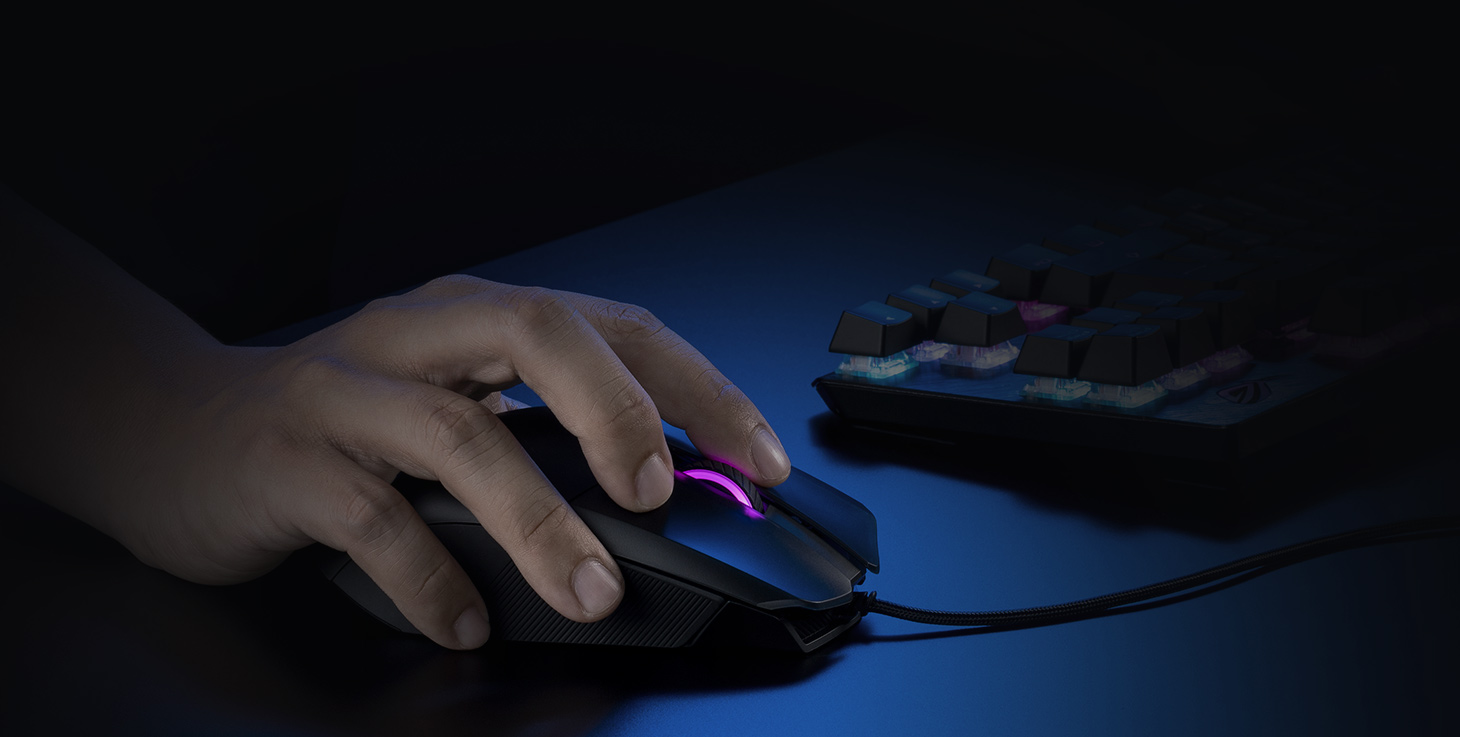 A gamer using ROG Chakram Core