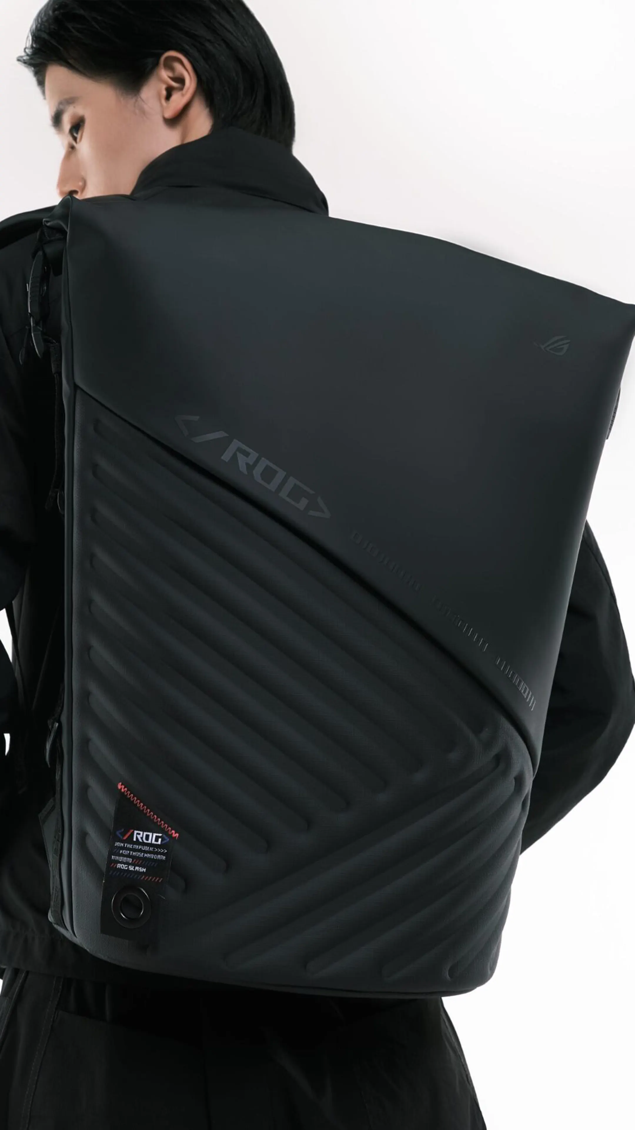 Two images of an ROG SLASH Backpack 4.0, one alone on a white background, the other with a person in black wearing the bag over their back.