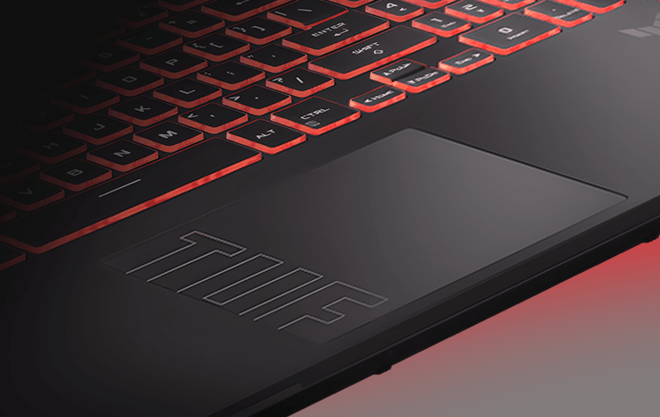 A close-up view of the TUF Gaming A16’s lower keyboard and trackpad, with the TUF logo clearly visible on the trackpad.